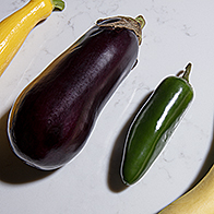 Various phallic vegetables are used to show different sizes and girth of a penis.