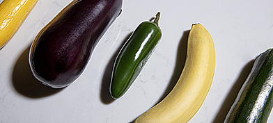 Various phallic vegetables are used to show different sizes and girth of a penis.
