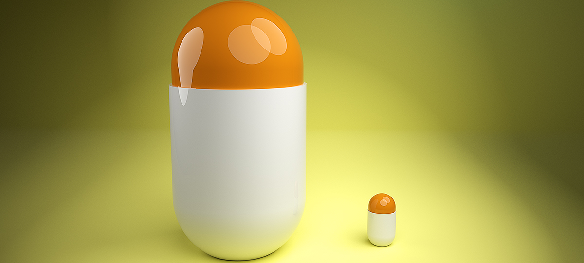 A larger and a smaller amphetamine pill side by side.