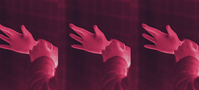 A pair of gloved hands ready to perform a male prostate massage.