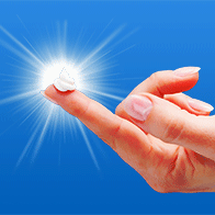 A dollop of testosterone cream for women on the tip of a finger.