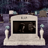 A steamy movie scene plays on a tombstone.