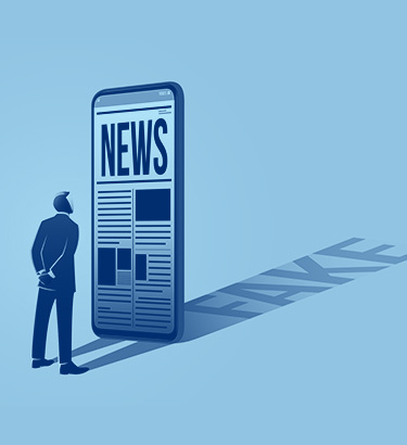 A man stares at cellphone larger than him with the news on it.