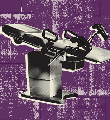 medical-table-sits-against-purple-background