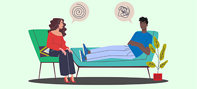 A-man-on-a-couch-talks-to-a-woman-in-a-chair