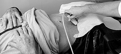 An-ultrasound-machine-looks-at-a-mans-pelvis