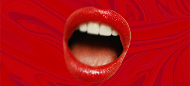 An open mouth with red lips is on a swirled red background. 