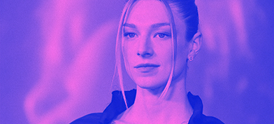 Trans actress Hunter Schafer from the TV show Euphoria poses for press photos with a purple overlay.