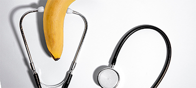A stethoscope is attached to a banana.
