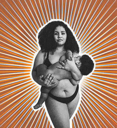 A woman holds her baby against against a brown background.