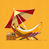 A banana lays in a beach chair underneath an umbrella and next to a picnic basket.