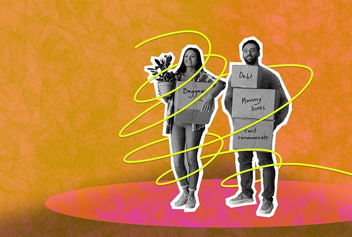 A man and woman stand next to each other holding multiple cardboard boxes labeled with their figurative baggage.
