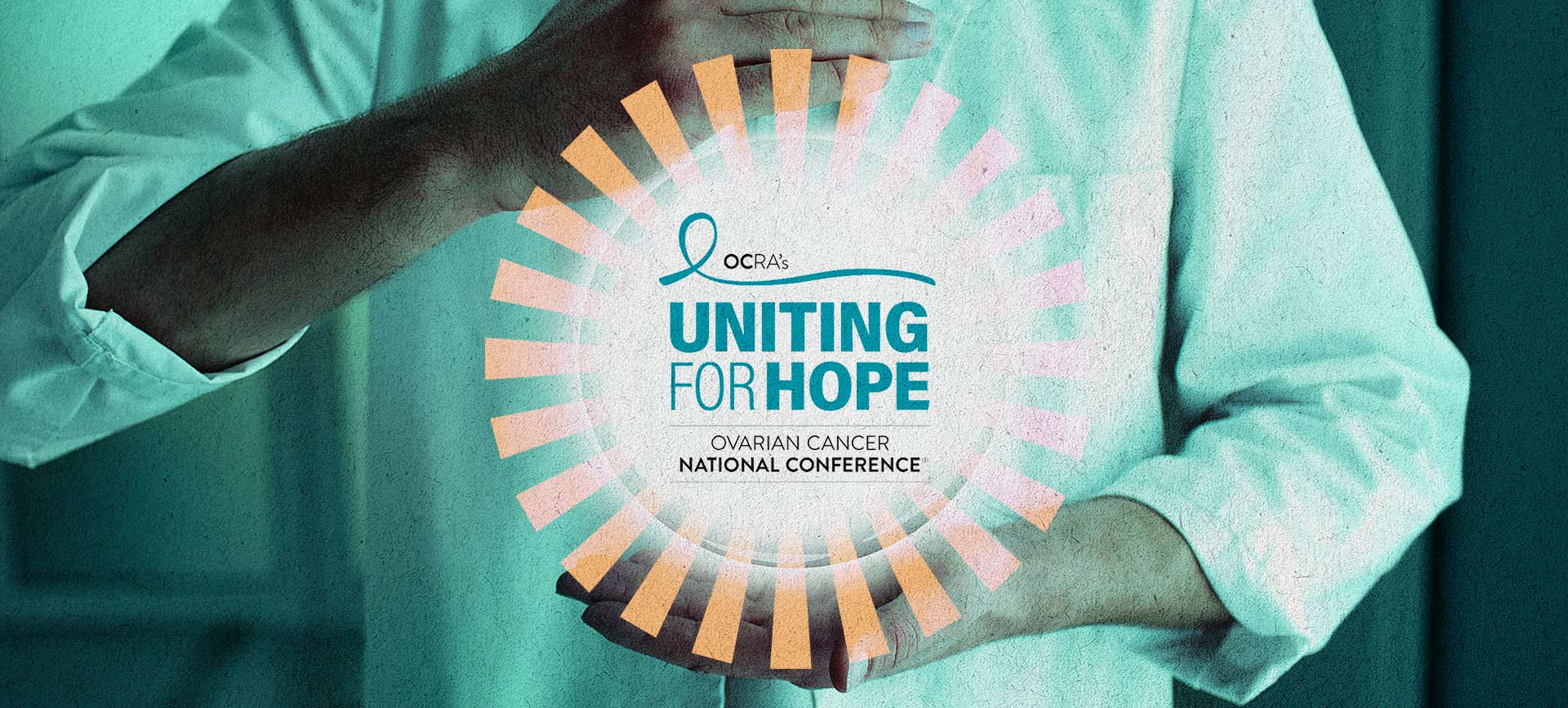 Two hands hold a floating logo for the OCRA conference.