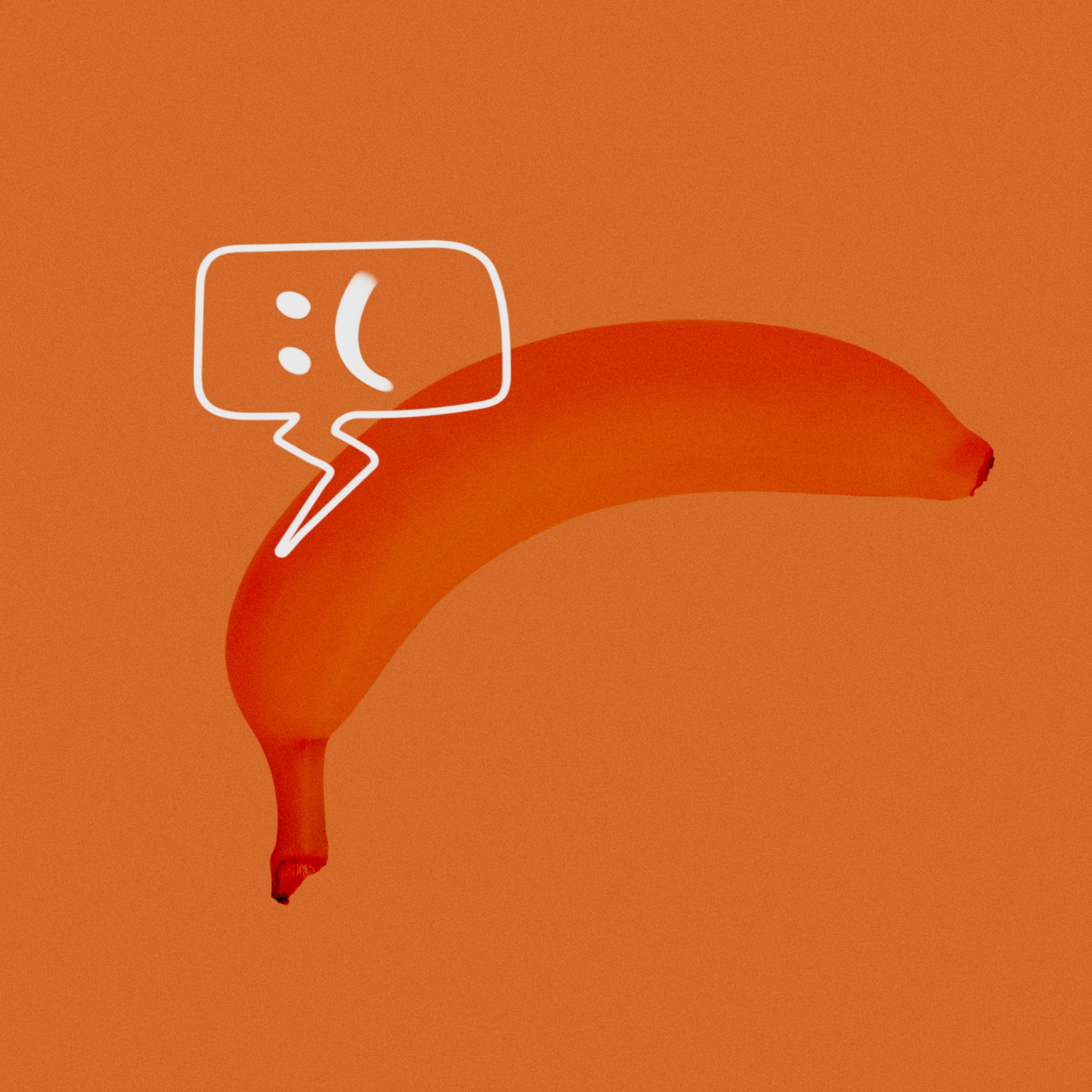 A banana curves downward and a chat bubble above it has a frown emoticon.