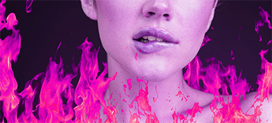 A woman bites her lower lip as pink and coral flames surround her shoulders.