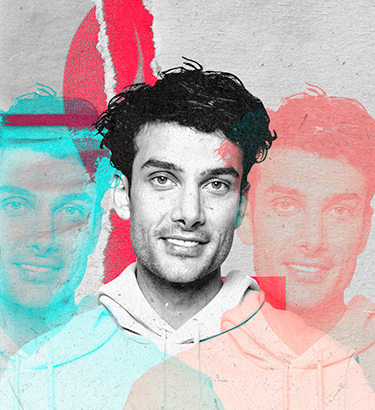 A black and white photo of a man casts a turquoise and pink image of himself on either side.