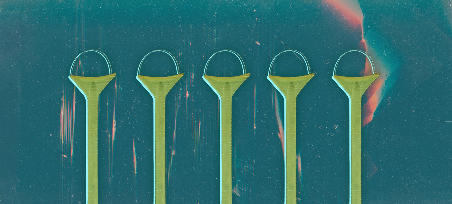 Five green LEEP loops stand upright on a darker green background.