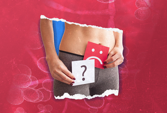 a question mark and frowning face cards are held in front of a woman's vaginal region