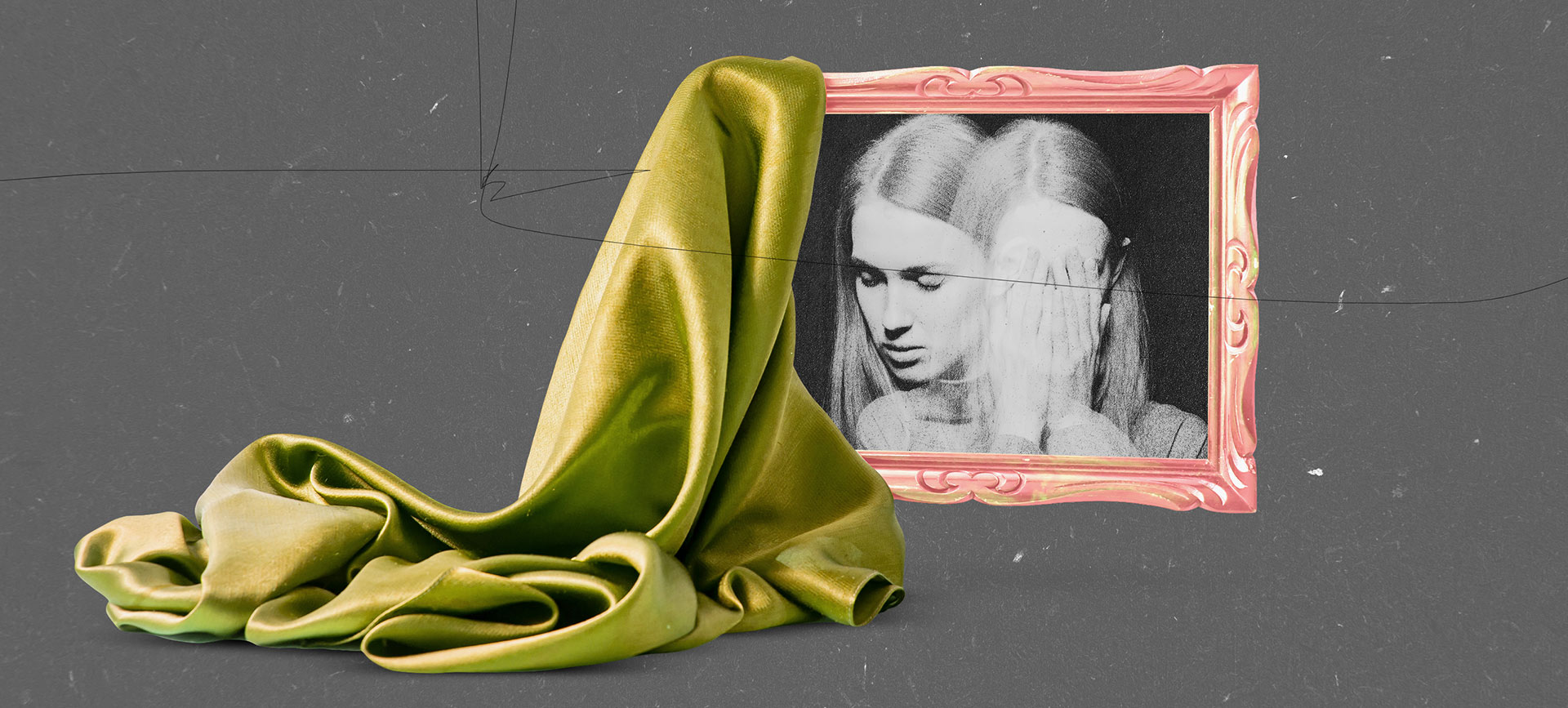 black and white photo of woman holding her head in her hands in a pink frame with green satin draped over one corner on gray background