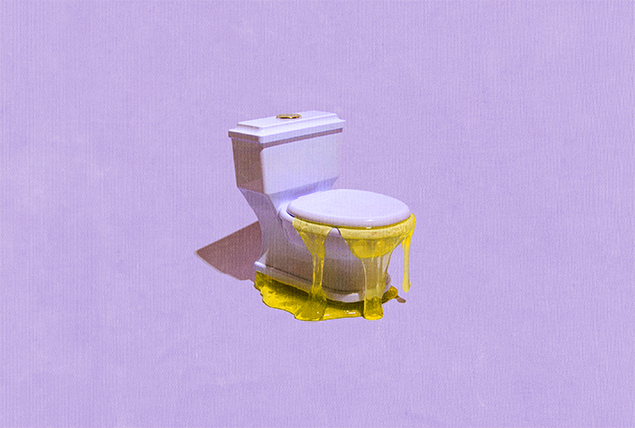 Yellow gel overflows out of a toilet.