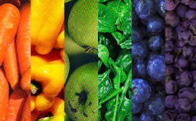 A rainbow gradient comprised of multiple foods.