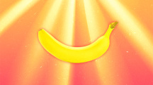 A banana is against an orange background with yellow beams of sunlight shining down on it.